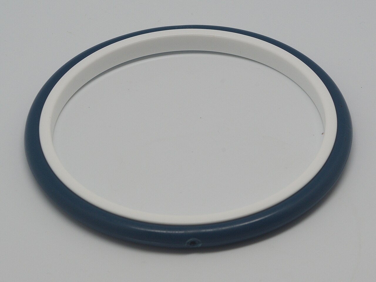 Two-part plastic embroidery hoop on a white background